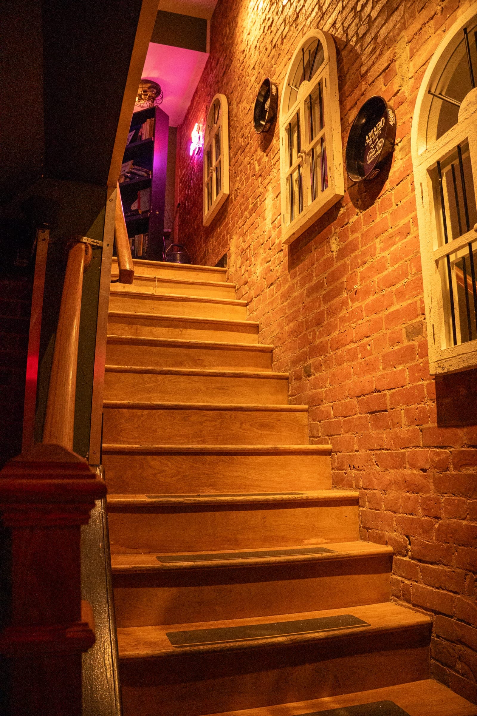 The brick staircase and vinyl record display at Sofra on 14th